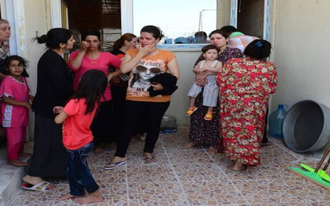 "مسيحيو الموصل يفرّون من "داعش